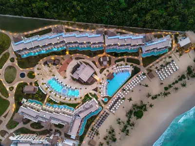 an aerial view of a resort on the beach at Secrets Playa Esmeralda Resort & Spa - All Inclusive in Miches