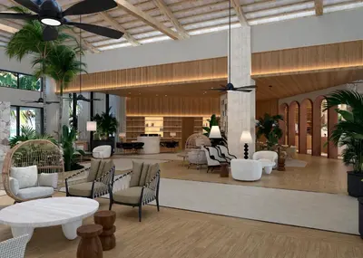 a lobby with white chairs and tables and a room at Secrets Playa Esmeralda Resort & Spa - All Inclusive in Miches
