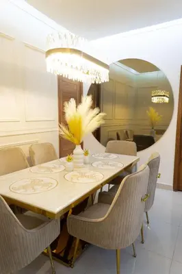 a dining room with a table and chairs at Apartamento en el gran santo Domingo in Santo Domingo