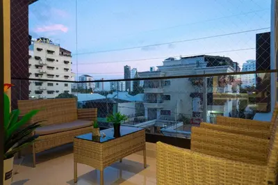 a balcony with a view of a city at Apartamento en el gran santo Domingo in Santo Domingo
