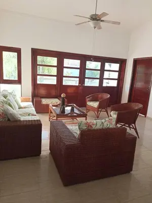 a living room with two couches and a table at Apartamento Corozos 2-202 in Paraíso