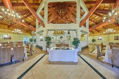 a large banquet hall with tables and chairs at Bahia Principe Grand La Romana - All Inclusive in La Romana