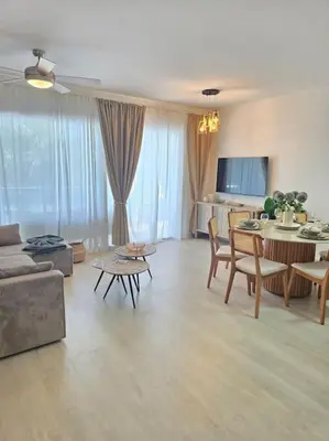 a living room with a couch and a table at Luxury Apartment IZHA 202 in La Laguna
