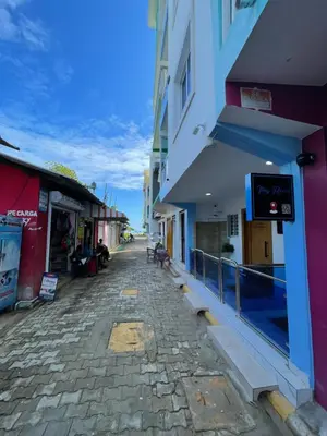 an empty street next to a building at Tiny Home-El Pueblito in San Felipe de Puerto Plata