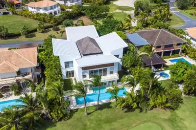 an aerial view of a house with a swimming pool at New private luxury villa in Punta Cana in Punta Cana