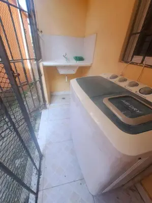 a small kitchen with a stove and a sink at Encantador Apartamento Pequeño in Hornillo