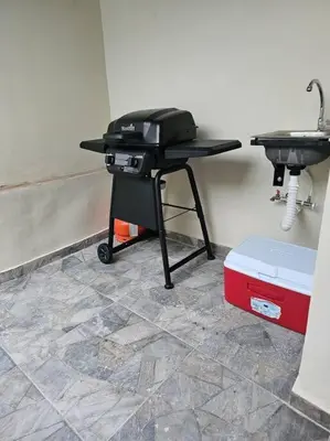 a room with a table and a sink at vista a toda la ciudad y montaña in San Felipe de Puerto Plata