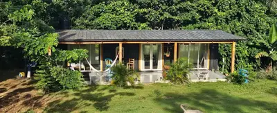 a small house in the middle of a yard at Rincón de Paz in Jarabacoa