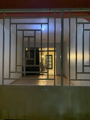a view of a building through a glass window at Fantástico con luz aire tv y cocina in La Romana