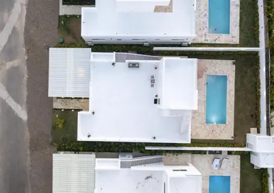 an overhead view of white buildings in a yard at Villa Ruby Bella in Sosúa