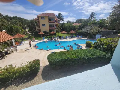an overhead view of a swimming pool at a resort at Blue fish apartamento in Sosúa