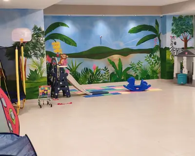 a room with a mural on the wall at Style and Confort Apart Villa Palmera in Santo Domingo