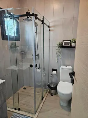 a bathroom with a shower and a toilet at Las Terrenas Paradise in Las Terrenas