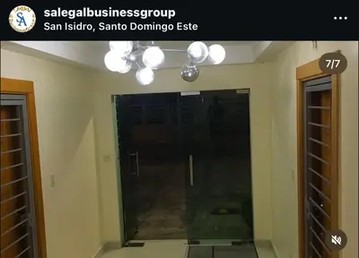 a glass shower in a room with lights on the wall at S A Business RENTAL SALE in Juan López
