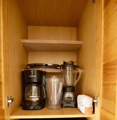 a cupboard with a coffee maker and a blender at JardinesDelMontSerrat-LasTerrenas-NearBeach Cozy 2BR-3BDS-6PAX-WiFi in Las Terrenas