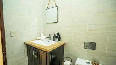a bathroom with a sink and a mirror at Ketsys Home Near Santo Cerro in Concepción de La Vega