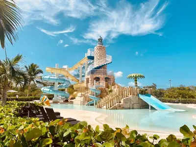 a water park with a water slide at 2BR 2BA Beachfront With View 62 in Bayahibe