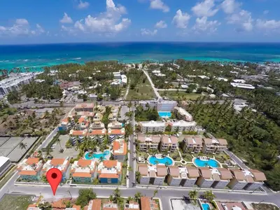 an aerial view of a resort with a red marker at Backyard, Pool View, Walk to Beach, Dining, Shops in Punta Cana