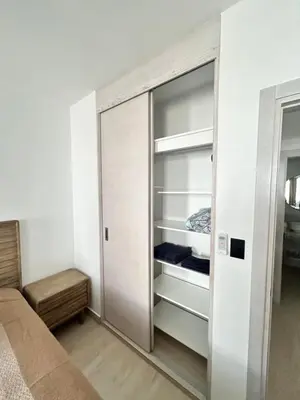 a room with a closet with a glass door at Caribbean Dream Condo AC WIFI in La Laguna