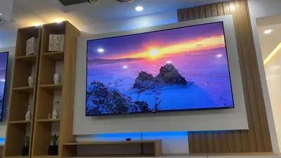 a flat screen tv on a wall in a living room at Apartamento in Mendoza