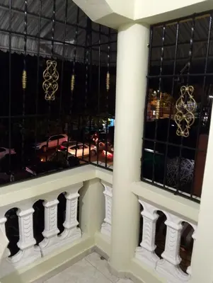 a view of a building with black windows at confor y seguridad in Santo Domingo
