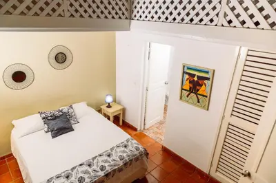 a bedroom with a bed in a room at Beach Hotel Casa Nina in Las Terrenas