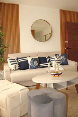 a living room with a couch and a table at Apartamento Playa Juan dolio in Villas del Mar