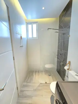 a bathroom with a shower and a toilet at Beautiful Apartment 10 min from Bayahibe beach Las Terrazas in Bayahibe
