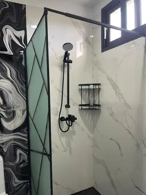 a shower in a bathroom with a glass door at Apartamento Entre Playas - 5 pax, 4 min de la playa in Las Galeras