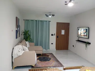a living room with a couch and a tv at Heaven apart cerca del aeropuerto parqueo incluído TAXI DISPONIBLE in Monte Adentro