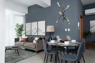 a living room with a table and a couch at Armonia 30 suites by Yellowkey in Los Prados