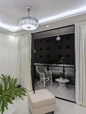 a living room with a couch and a table and chairs at Marbella in San Felipe de Puerto Plata
