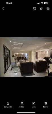 a picture of a living room with a couch at Punta cana in El Seis