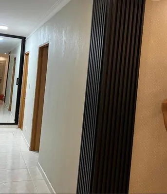 a room with black and white stripes on the wall at Punta cana in El Seis