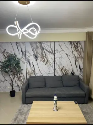 a living room with a couch and a table at Boca chica retreat in Boca Chica