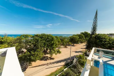an ocean view from the balcony of a house at Reina del Mar 5 in Cafemba