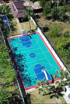 an overhead view of an empty basketball court at Blue Lux in Santiago de los Caballeros