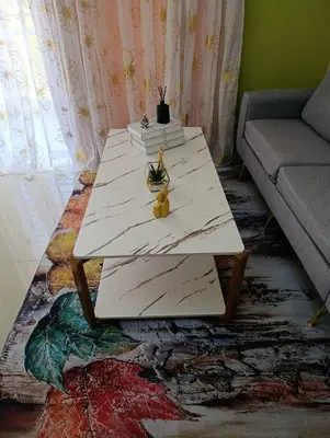 a coffee table with two teddy bears sitting on it at El descanso perfecto in El Cruce