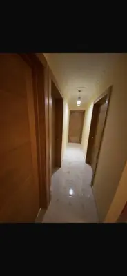 an empty hallway in a building with two doors at The Garcias Village C with Jacuzzi ACNetflix in La Alianza