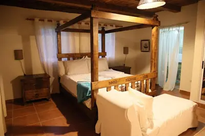 a bedroom with two bunk beds in a room at Villa Claudia Constanza in Arroyo Frío
