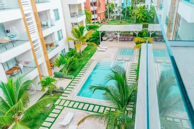 an overhead view of a swimming pool in a building at Punta cana apparment close to the beach in Punta Cana