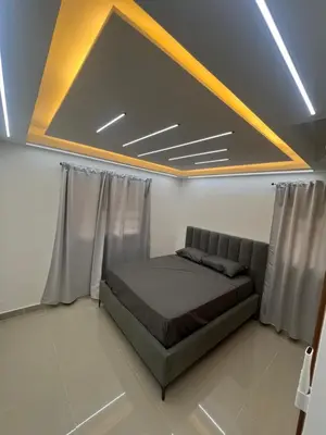 a bedroom with a bed in a room at Apartamento de Lujo in La Estrella