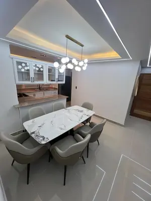 a dining room with a table and chairs at Apartamento de Lujo in La Estrella