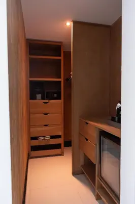 a kitchen with a dresser and a cupboard at The Ocean Club, a Luxury Collection Resort, Costa Norte in Sosúa