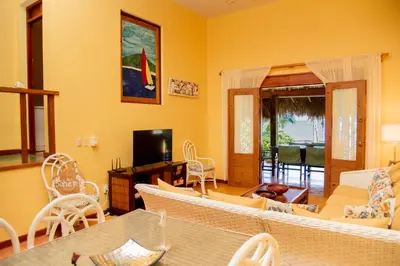 a living room with a couch and a table at Villa Caribeña in Las Galeras