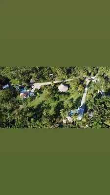 an overhead view of a park with trees and a road at villas ecologicas hacienda vista linda in Cabrera