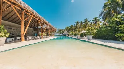 a pool at the resort at Charming two-bedroom apartment in Las Terrenas in Las Terrenas