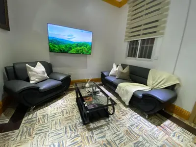 a living room with two couches and a table at Colonial zone 3 bed 3 rooms balcony in Santo Domingo