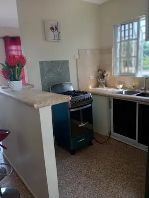 a kitchen with a stove and a counter top at SDQ Apartment Marbella 4 in La Ureña