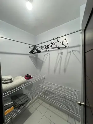 a white refrigerator with its door open with its door at Apartamento amueblado in Arenoso